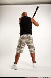 Man Adult Athletic Black Standing poses Casual Fighting with bat